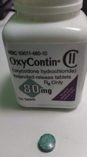 Loose green Oxynorm 80mg tablets